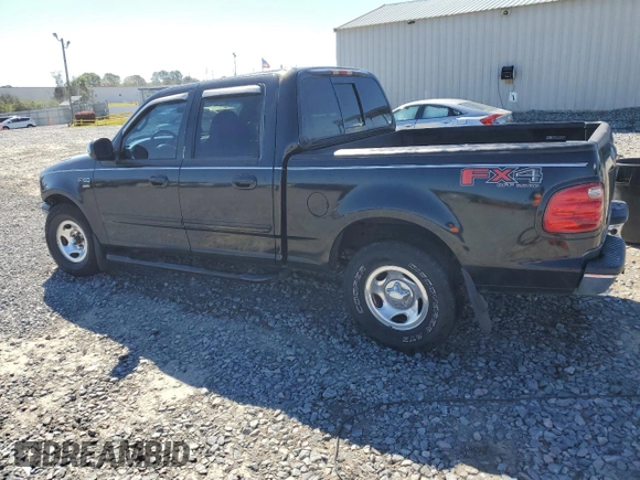 2001 Ford F-150 XLT with VIN 1FTRW07W11KE08545, listed as a Copart auction lot 49869415 with 264,349 mi miles and Salvage title. Bid and sale history available at DreamBid. Image 2.