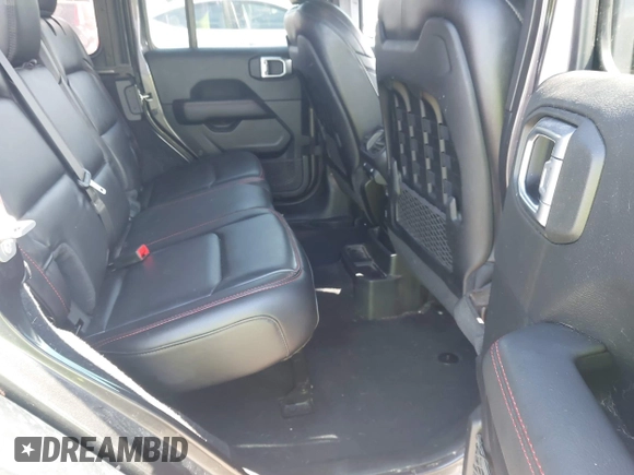 2021 Jeep Wrangler Unlimited Rubicon with VIN 1C4HJXFN5MW509483, listed as a IAAI auction lot 42245703 with 59,461 mi miles and . Bid and sale history available at DreamBid. Image 8.