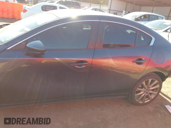 2021 Mazda 3 Select with VIN JM1BPBBL0M1329224, listed as a IAAI auction lot 41348699 with 12,338 mi miles and . Bid and sale history available at carsss.com. Image 15.