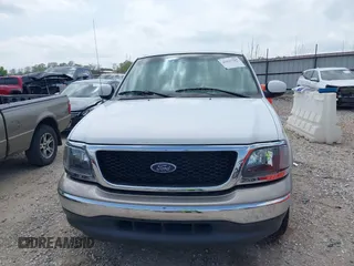2003 Ford F-150 XL with VIN 1FTRX17L33NB79733, listed as a IAAI auction lot 42023385 with 136,236 mi miles. Bid and sale history available at carsss.com. Image 12.
