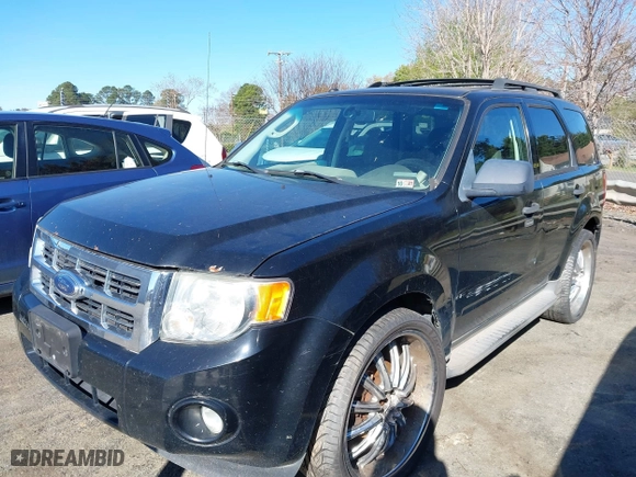 2009 Ford Escape XLT with VIN 1FMCU93G49KD15671, listed as a IAAI auction lot 41751527 with 208,697 mi miles. Bid and sale history available at carsss.com. Image 2.