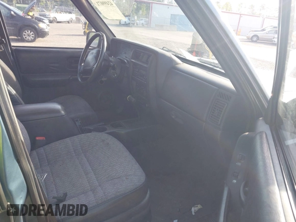 1999 Jeep Cherokee Sport with VIN 1J4FT68S9XL581835, listed as a IAAI auction lot 42499071 with 203,782 mi miles and . Bid and sale history available at DreamBid. Image 5.