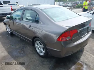 2010 Honda Civic LX-S z VIN 2HGFA1F60AH544781, wystawiony jako IAAI lot #42303801 z przebiegiem 168 544 mil mil oraz . Historia ofert i sprzedaży dostępna na DreamBid. Obrazek 3.