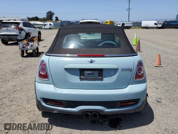 2013 MINI Convertible S z VIN WMWZP3C54DT551321, wystawiony jako Copart lot #57089205 z przebiegiem 92 441 mil mil oraz Szkoda całkowita • Salvage title. Historia ofert i sprzedaży dostępna na DreamBid. Obrazek 6.