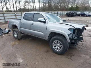 2019 Toyota Tacoma 4WD SR with VIN 3TMGZ5AN8KM259475, listed as a IAAI auction lot 41569810 with 61,405 mi miles. Bid and sale history available at carsss.com. Image 1.