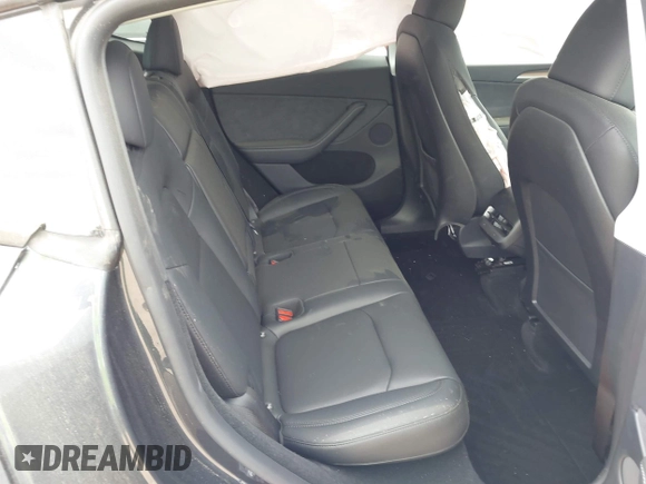 2024 Tesla Model Y with VIN 7SAYGDED3RA303113, listed as a IAAI auction lot 41915760 with 12,917 mi miles and . Bid and sale history available at DreamBid. Image 8.