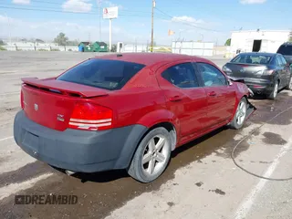 2008 Dodge Avenger SXT with VIN 1B3LC56R98N169618, listed as a IAAI auction lot 40626545 with 153,921 mi miles. Bid and sale history available at carsss.com. Image 4.