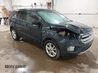 2019 Ford Escape SE z VIN 1FMCU9GD2KUA31904, wystawiony jako IAAI lot #41843341 z przebiegiem 125 605 mil mil oraz . Historia ofert i sprzedaży dostępna na DreamBid. Obrazek 1.