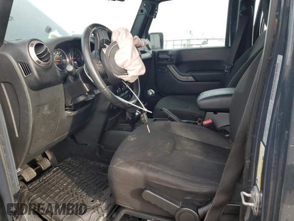 2018 Jeep Wrangler JK Unlimited Sport with VIN 1C4BJWDG0JL834219, listed as a Copart auction lot 87192904 with 77,452 mi miles and Salvage Title. Bid and sale history available at carsss.com. Image 7.