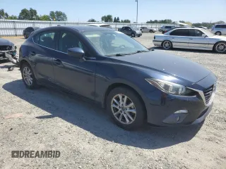 2015 Mazda 3 i Grand Touring z VIN 3MZBM1M72FM145070, wystawiony jako Copart lot #58419525 z przebiegiem 61 255 mil mil oraz Szkoda całkowita • Salvage title. Historia ofert i sprzedaży dostępna na DreamBid. Obrazek 4.