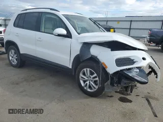 2017 Volkswagen Tiguan S with VIN WVGAV7AX9HK017871, listed as a Copart auction lot 48767785 with 49,608 mi miles and Salvage Title. Bid and sale history available at DreamBid. Image 4.