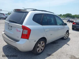 2007 Kia Rondo LX with VIN KNAFG525777087180, listed as a IAAI auction lot 42094657 with 125,256 mi miles. Bid and sale history available at carsss.com. Image 4.