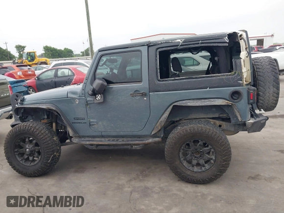 2015 Jeep Wrangler Sport with VIN 1C4GJWAG7FL585631, listed as a IAAI auction lot 41943582 with 88,649 mi miles and . Bid and sale history available at DreamBid. Image 14.