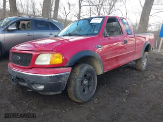 2004 Ford F-150 Heritage XL with VIN 2FTRX18W64CA22312, listed as a IAAI auction lot 41686082 with 143,544 mi miles. Bid and sale history available at carsss.com. Image 17.