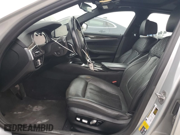 2018 BMW 5 Series 530e xDrive with VIN WBAJB1C58JB084292, listed as a Copart auction lot 51213575 with 105,277 mi miles and Clean title. Bid and sale history available at DreamBid. Image 7.
