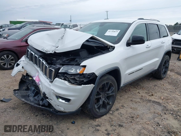 2018 Jeep Grand Cherokee Laredo E with VIN 1C4RJEAG7JC322888, listed as a IAAI auction lot 41756833 with 129,988 mi miles and . Bid and sale history available at DreamBid. Image 17.