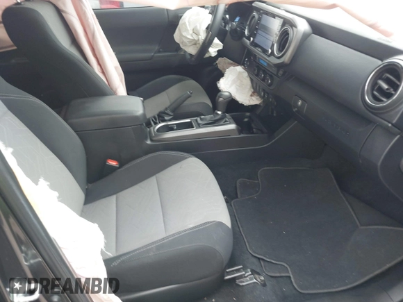 2022 Toyota Tacoma SR5 with VIN 3TMAZ5CN6NM186713, listed as a IAAI auction lot 42607719 with 60,704 mi miles and . Bid and sale history available at DreamBid. Image 5.