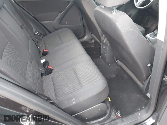 2017 Volkswagen Tiguan S with VIN WVGBV7AX7HK047973, listed as a IAAI auction lot 41197329 with 92,960 mi miles and . Bid and sale history available at DreamBid. Image 8.