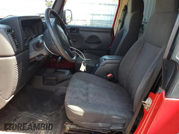 2005 Jeep Wrangler X with VIN 1J4FA39S35P360241, listed as a Copart auction lot 63486375 with 85,051 mi miles and Salvage title. Bid and sale history available at DreamBid. Image 7.