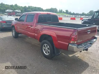 2014 Toyota Tacoma with VIN 3TMMU4FN8EM068048, listed as a IAAI auction lot 42548095 with 126,332 mi miles and . Bid and sale history available at DreamBid. Image 3.