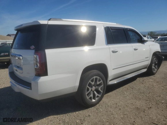 2015 GMC Yukon XL Denali with VIN 1GKS2JKJ6FR264217, listed as a Copart auction lot 49255285 with 166,307 mi miles and Salvage Title. Bid and sale history available at carsss.com. Image 3.