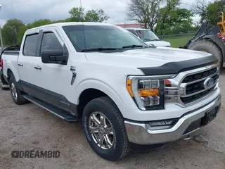 2021 Ford F-150 XL with VIN 1FTFW1ED7MFB36946, listed as a IAAI auction lot 42318029 with 16,960 mi miles and . Bid and sale history available at DreamBid. Image 1.