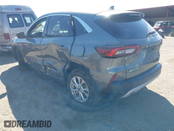 2023 Ford Escape Active with VIN 1FMCU0GZ1PUA35697, listed as a IAAI auction lot 41886290 with 82,824 mi miles and . Bid and sale history available at DreamBid. Image 3.
