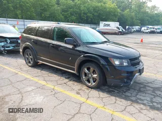 2015 Dodge Journey Crossroad with VIN 3C4PDDGG6FT740760, listed as a IAAI auction lot 42428742 with 215,219 mi miles and . Bid and sale history available at DreamBid. Image 1.