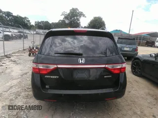 2012 Honda Odyssey Touring with VIN 5FNRL5H97CB066596, listed as a IAAI auction lot 42472935 with 217,182 mi miles and . Bid and sale history available at DreamBid. Image 16.