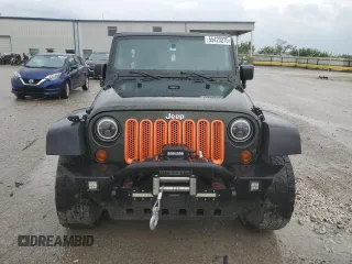 2011 Jeep Wrangler Unlimited Rubicon z VIN 1J4BA6H16BL615993, wystawiony jako Copart lot #55420275 z przebiegiem 200 403 mil mil oraz Szkoda całkowita • Salvage title. Historia ofert i sprzedaży dostępna na DreamBid. Obrazek 5.