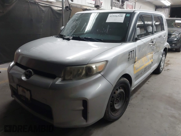 2012 Scion xB with VIN JTLZE4FE5CJ028608, listed as a IAAI auction lot 41916318 with 233,007 mi miles. Bid and sale history available at carsss.com. Image 2.