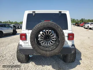 2023 Jeep Wrangler 4xe Sahara with VIN 1C4JJXP62PW524570, listed as a Copart auction lot 52927855 with 54,254 mi miles and Salvage Title. Bid and sale history available at carsss.com. Image 6.