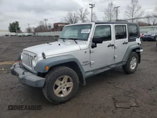 2010 Jeep Wrangler Unlimited Sport with VIN 1J4BA3H1XAL204156, listed as a Copart auction lot 52935355 with 215,228 mi miles and Salvage Title. Bid and sale history available at carsss.com. Image 1.