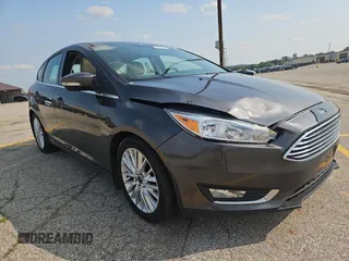 2017 Ford Focus Titanium с VIN 1FADP3N22HL279489, выставлен на аукционе Copart как лот 60740945 с пробегом 111 654 миль миль и Чистый • Clean title. История ставок и продаж доступна на DreamBid. Изображение 1.