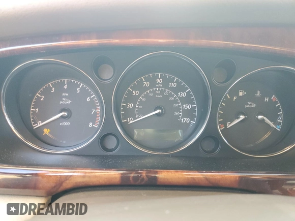 2005 Jaguar XJ with VIN SAJWA79C15SG48962, listed as a Copart auction lot 75674034 with 0 mi miles and Salvage Title. Bid and sale history available at carsss.com. Image 9.