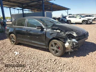 2012 Volkswagen Jetta Sedan TDI w/Premium & Nav with VIN 3VWLL7AJ6CM365026, listed as a Copart auction lot 50260375 with 191,576 mi miles and Salvage Title. Bid and sale history available at carsss.com. Image 4.