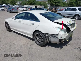 2015 Mercedes-Benz CLS 400 with VIN WDDLJ6HB9FA154511, listed as a IAAI auction lot 42155412 with 88,386 mi miles and . Bid and sale history available at DreamBid. Image 3.