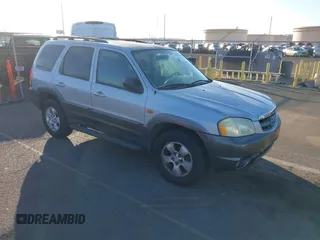 2004 Mazda Tribute LX with VIN 4F2YZ04174KM23373, listed as a IAAI auction lot 41392564 with 100,730 mi miles and . Bid and sale history available at DreamBid. Image 1.