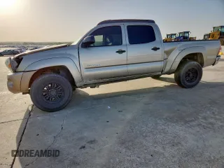 2005 Toyota Tacoma PreRunner z VIN 3TMKU72N85M003408, wystawiony jako Copart lot #57670935 z przebiegiem 247 189 mil mil oraz Szkoda całkowita • Salvage title. Historia ofert i sprzedaży dostępna na DreamBid. Obrazek 1.