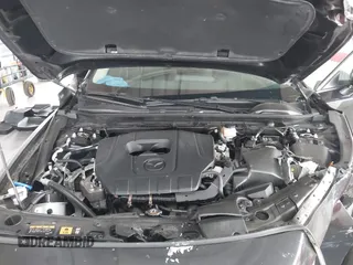 2024 Mazda 3 S Select Sport with VIN 3MZBPABM1RM408945, listed as a IAAI auction lot 42398805 with 42,283 mi miles and . Bid and sale history available at DreamBid. Image 10.