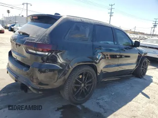 2018 Jeep Grand Cherokee Trackhawk z VIN 1C4RJFN90JC293820, wystawiony jako Copart lot #63778505 z przebiegiem 87 682 mil mil oraz Szkoda całkowita • Salvage title. Historia ofert i sprzedaży dostępna na DreamBid. Obrazek 3.