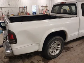 2002 Dodge Dakota SLT with VIN 1B7GL42X32S632375, listed as a IAAI auction lot 39909886 with 181,521 mi miles. Bid and sale history available at carsss.com. Image 22.