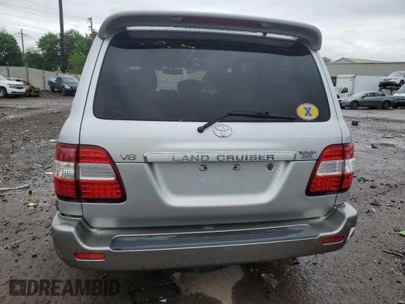 2006 Toyota Land Cruiser z VIN JTEHT05J262087016, wystawiony jako Copart lot #56294635 z przebiegiem 221 315 mil mil oraz Tytuł czysty. Historia ofert i sprzedaży dostępna na DreamBid. Obrazek 6.