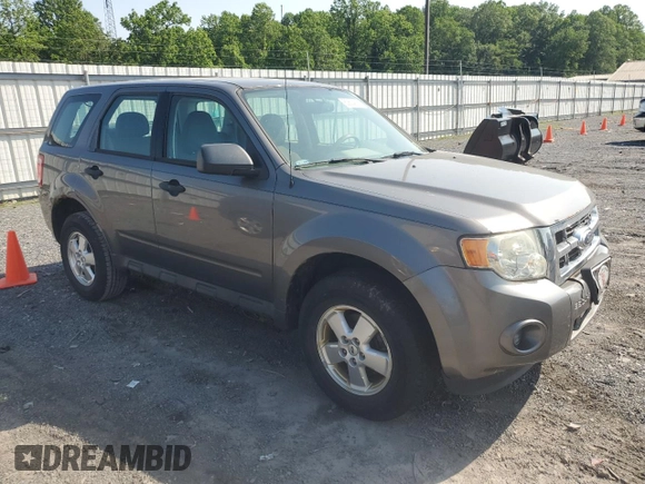 2012 Ford Escape XLS with VIN 1FMCU0C78CKA70652, listed as a Copart auction lot 60624215 with 203,220 mi miles and Clean title. Bid and sale history available at DreamBid. Image 4.