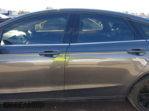 2018 Ford Fusion SE z VIN 3FA6P0H70JR191384, wystawiony jako IAAI lot #41340319 z przebiegiem 89 581 mil mil oraz . Historia ofert i sprzedaży dostępna na DreamBid. Obrazek 14.