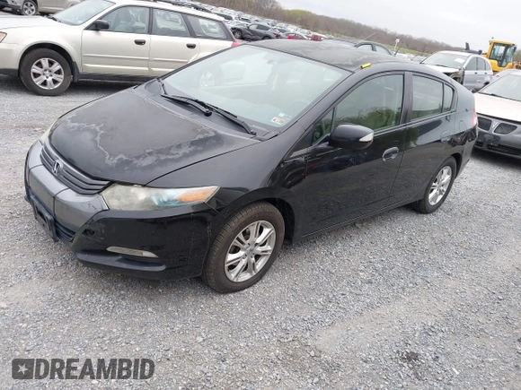 2010 Honda Insight EX with VIN JHMZE2H73AS002299, listed as a IAAI auction lot 41900761 with 251,934 mi miles and . Bid and sale history available at DreamBid. Image 2.