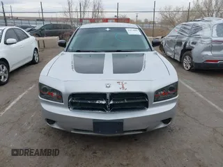 2010 Dodge Charger Police with VIN 2B3AA4CT1AH113596, listed as a IAAI auction lot 41674608 with 194,279 mi miles and . Bid and sale history available at DreamBid. Image 12.