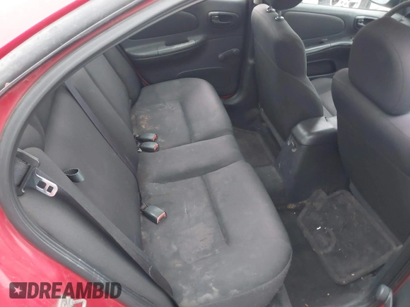 2004 Dodge Neon SXT with VIN 1B3ES56C74D536751, listed as a IAAI auction lot 41760363 with 218,973 mi miles. Bid and sale history available at carsss.com. Image 8.