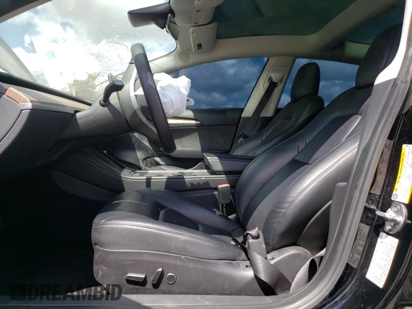 2023 Tesla Model 3 with VIN 5YJ3E1EA6PF454254, listed as a Copart auction lot 56881355 with 30,327 mi miles and Salvage title. Bid and sale history available at DreamBid. Image 7.