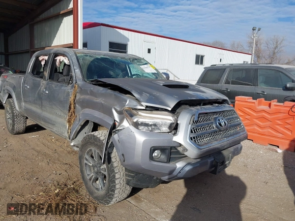 2017 Toyota Tacoma SR5 with VIN 3TMDZ5BN3HM025433, listed as a IAAI auction lot 41058797 with 68,355 mi miles and . Bid and sale history available at DreamBid. Image 6.
